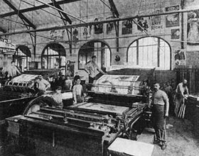 A view inside an early lithographic print shop.